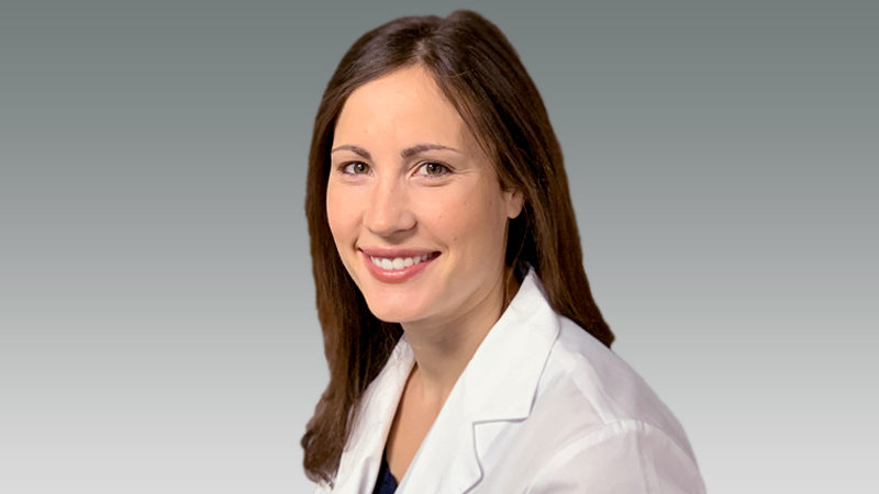 Stephanie Istvan in white coat smiling